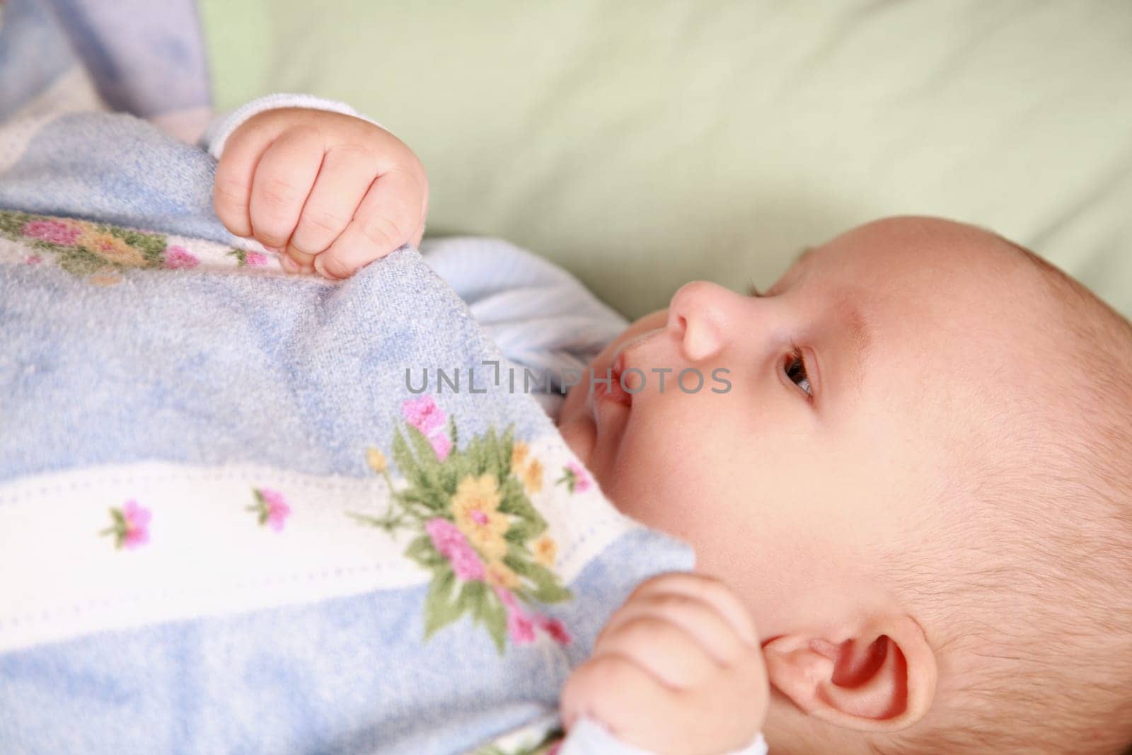 Adorable newborn in bed