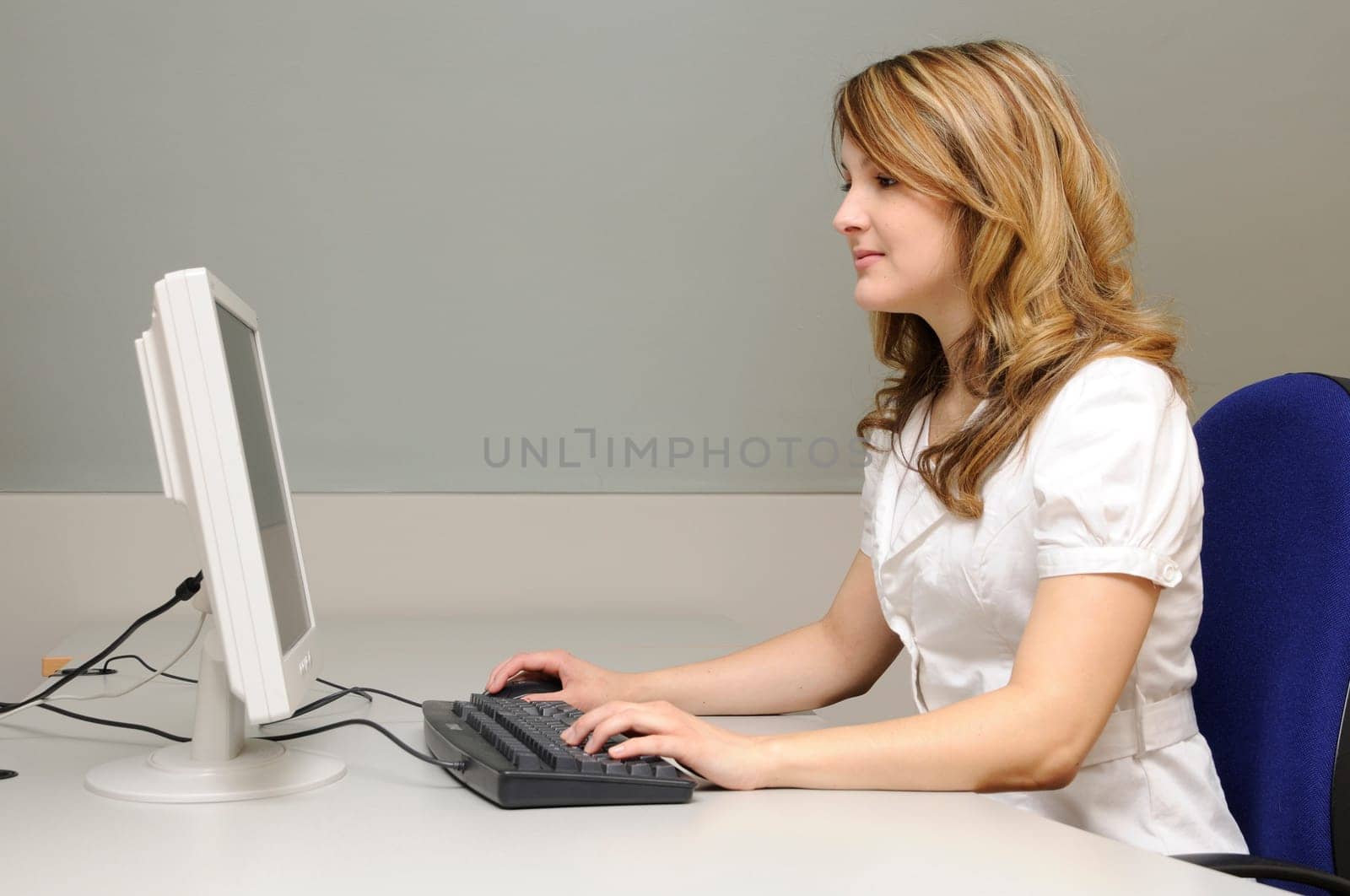 Young woman in office