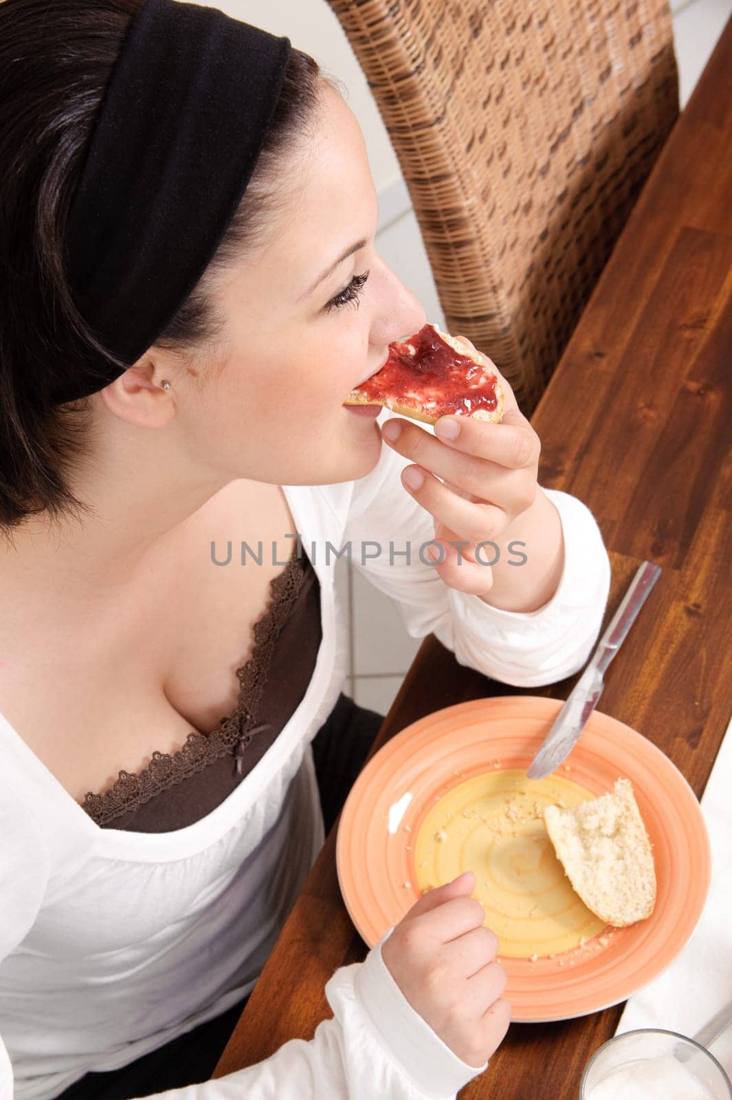 Young woman having breakfast