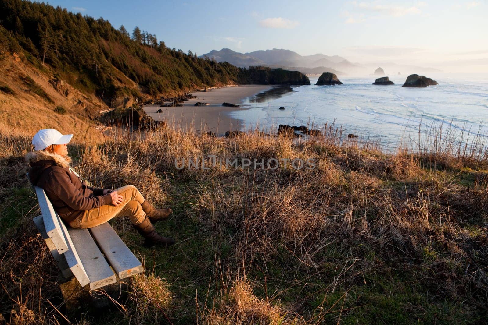 woman enjoying view at Oregon Coast