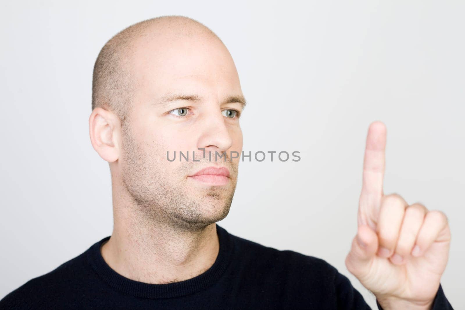 Man presses on a virtual screen
