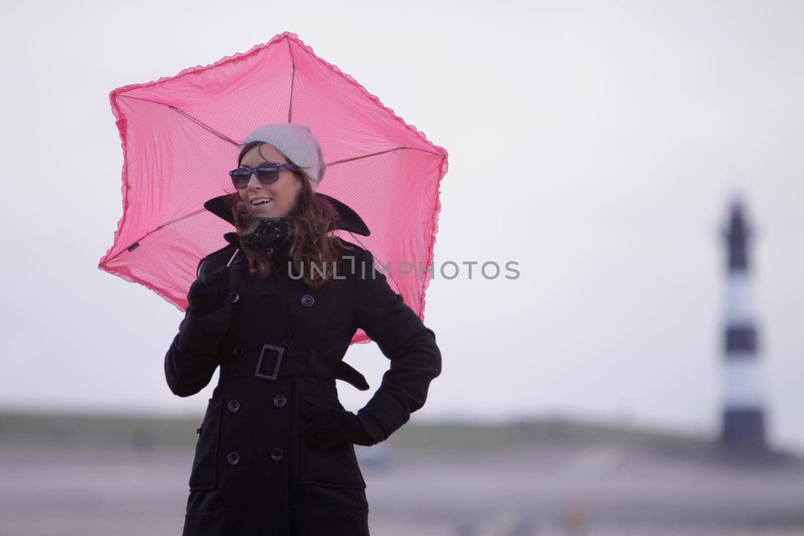 young woman with pink screen