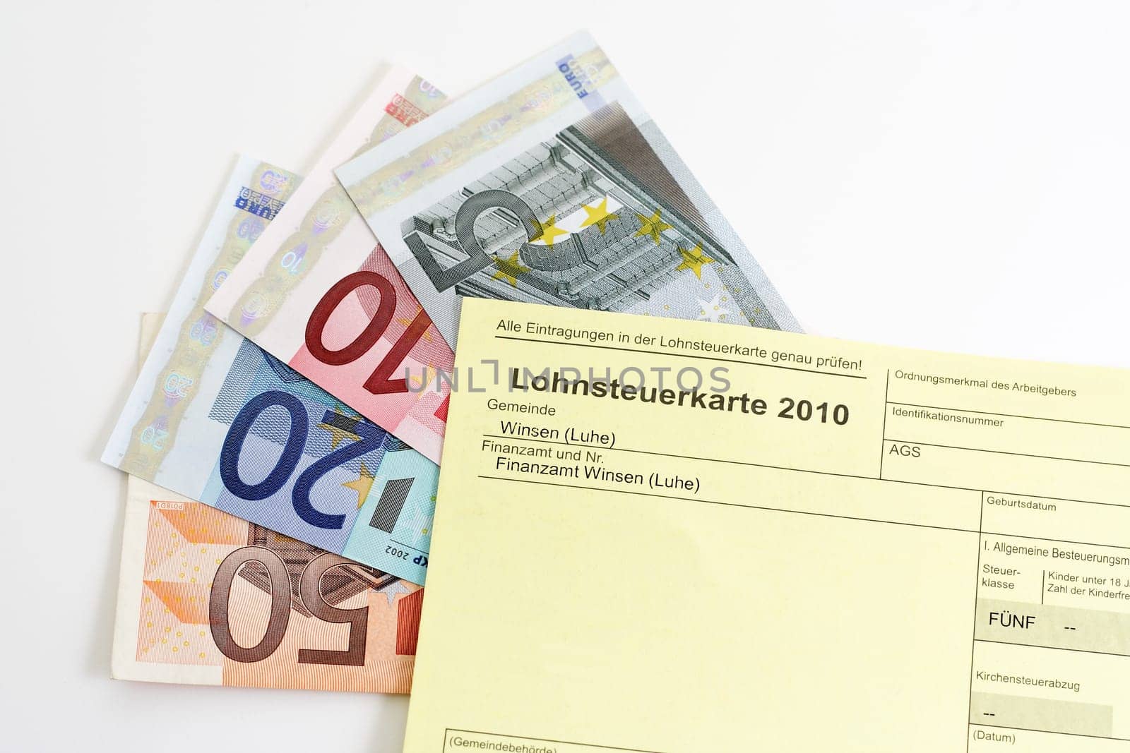 Income tax card 2010 with banknotes