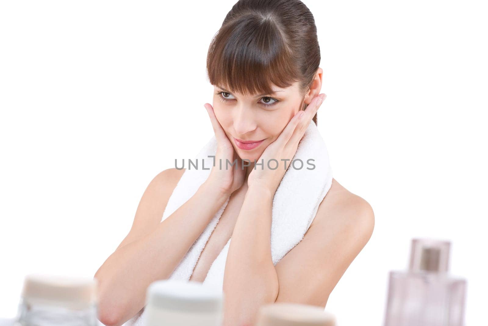 Body care Young woman applying powder with brush