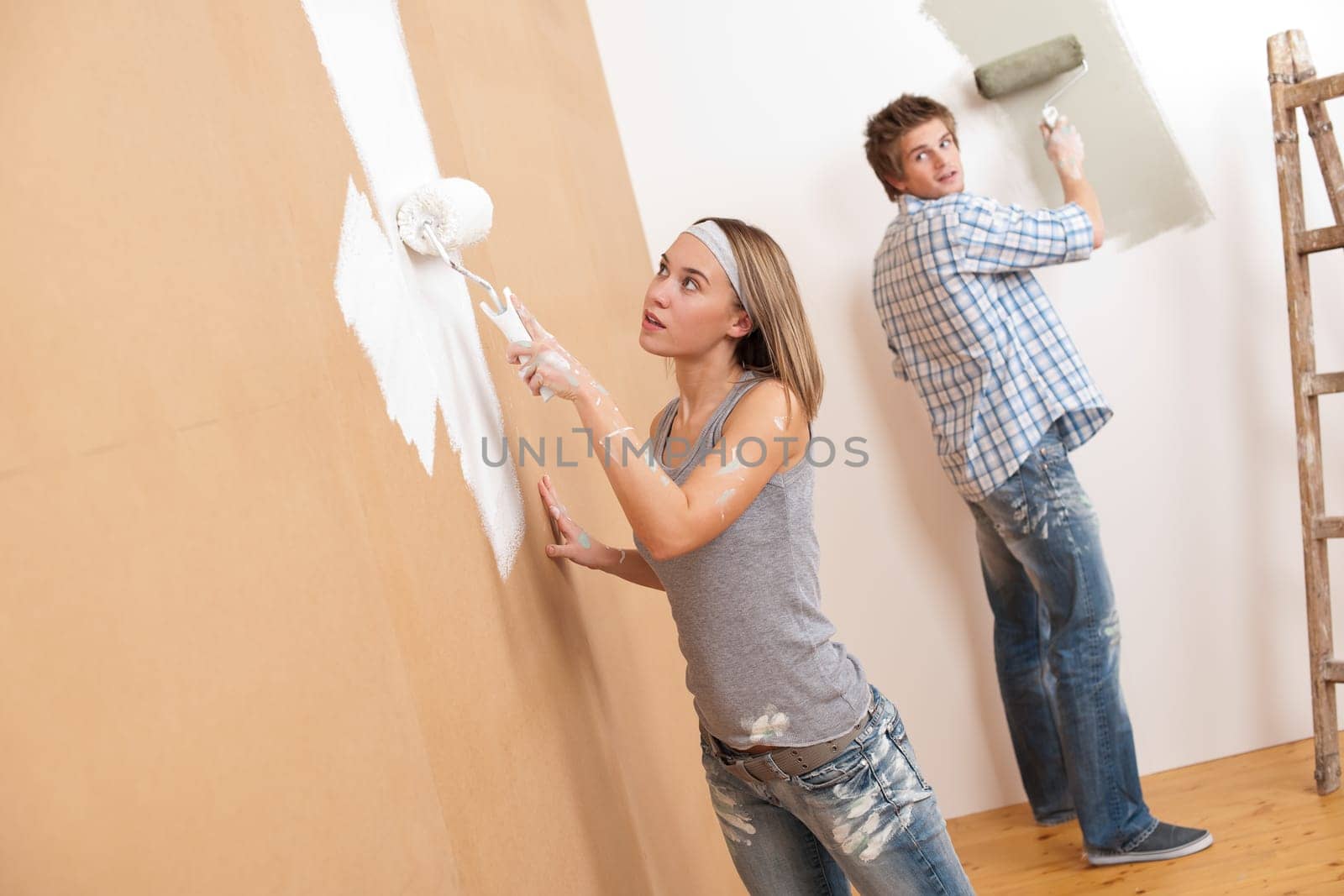 Home improvement Young couple painting
