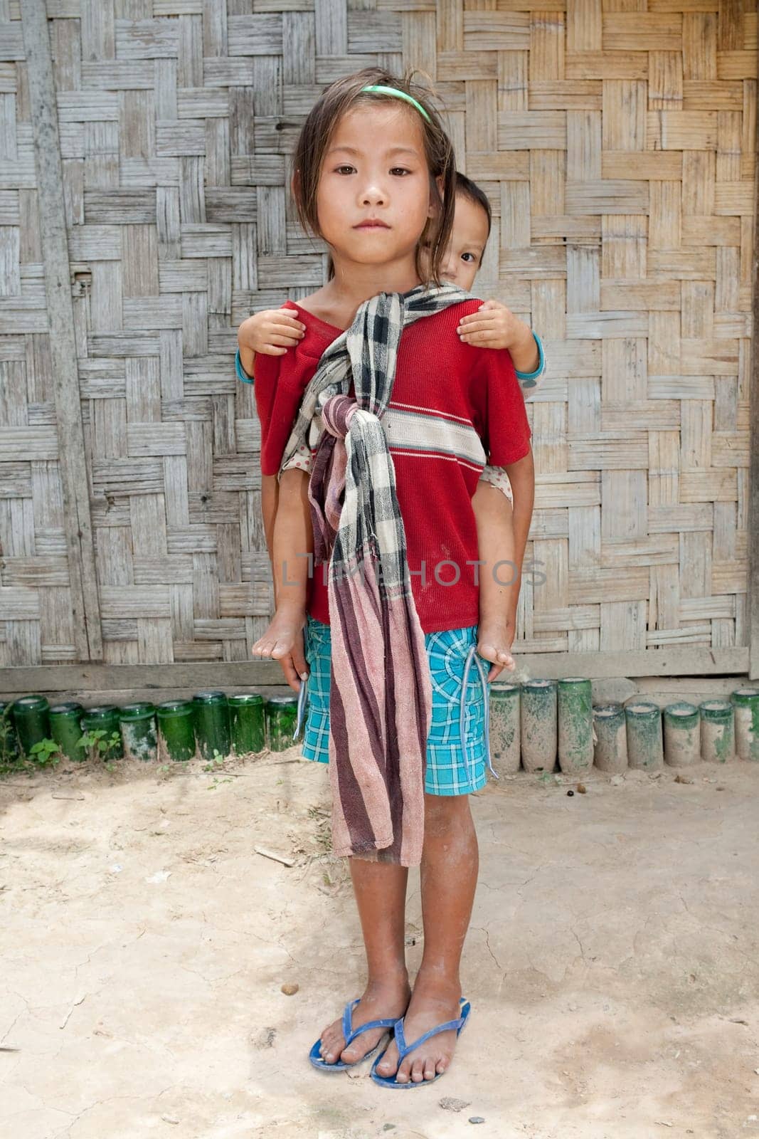 Girl from Laos with baby