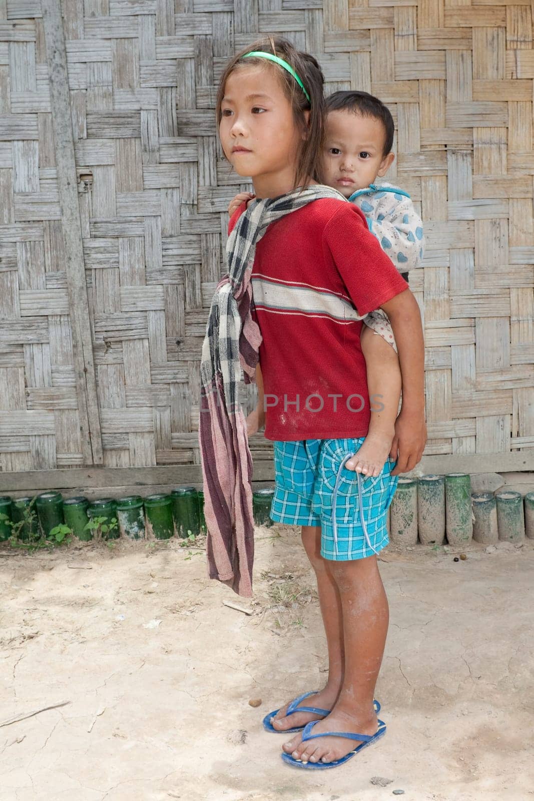 Girl from Laos with baby