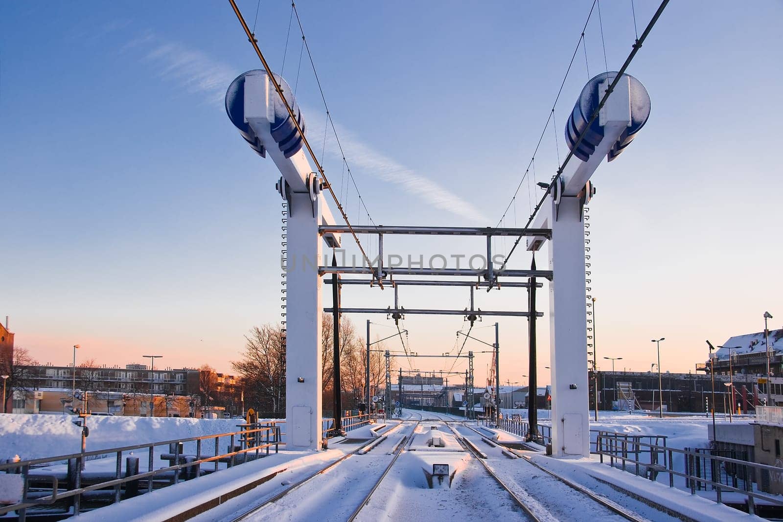 Train lifting bridge in the snow