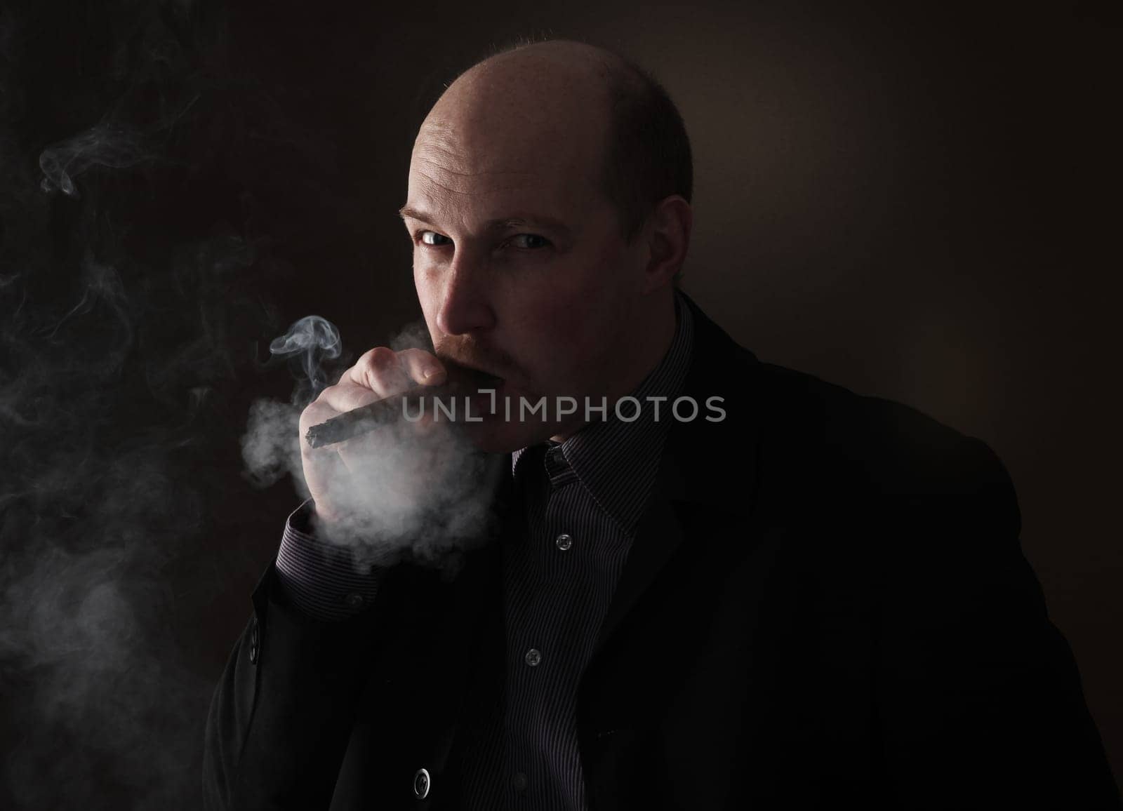 cigar smoking man