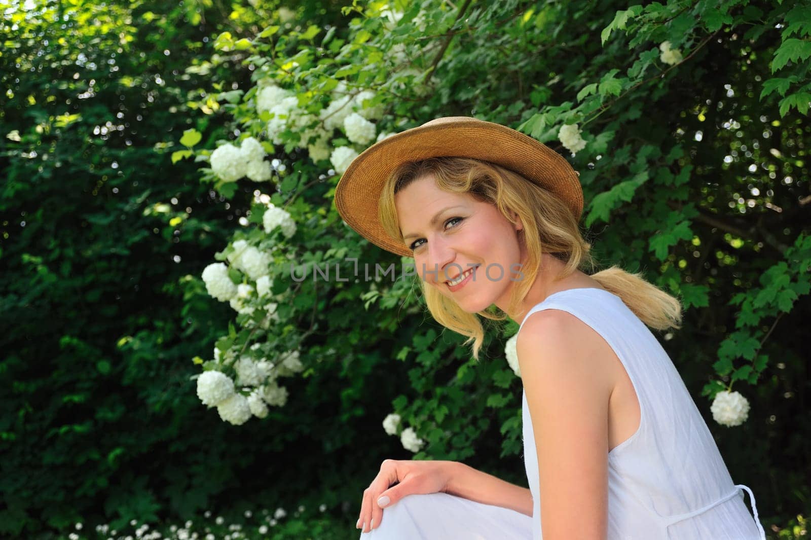 Young woman resting in garden