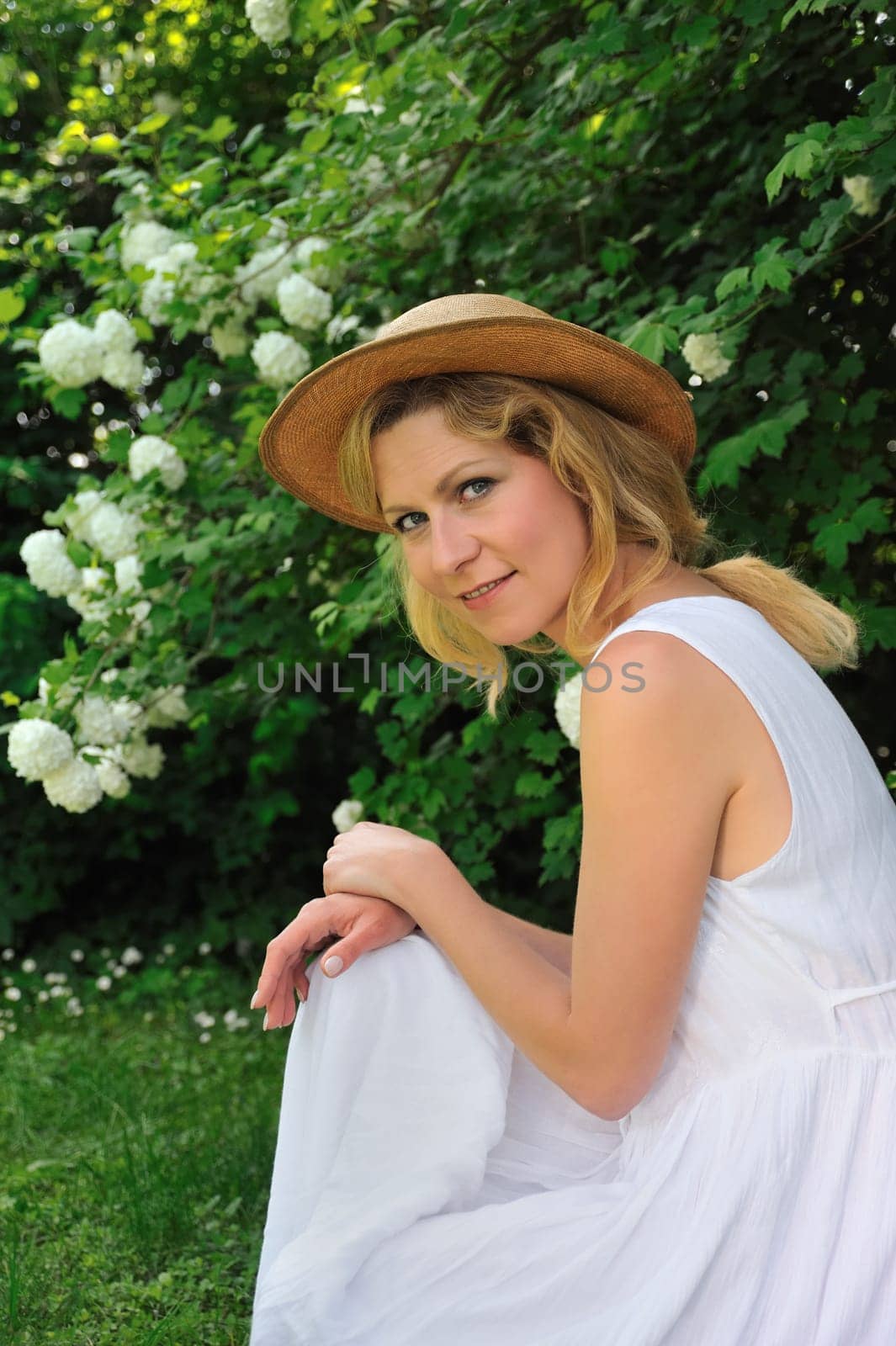 Young woman resting in garden