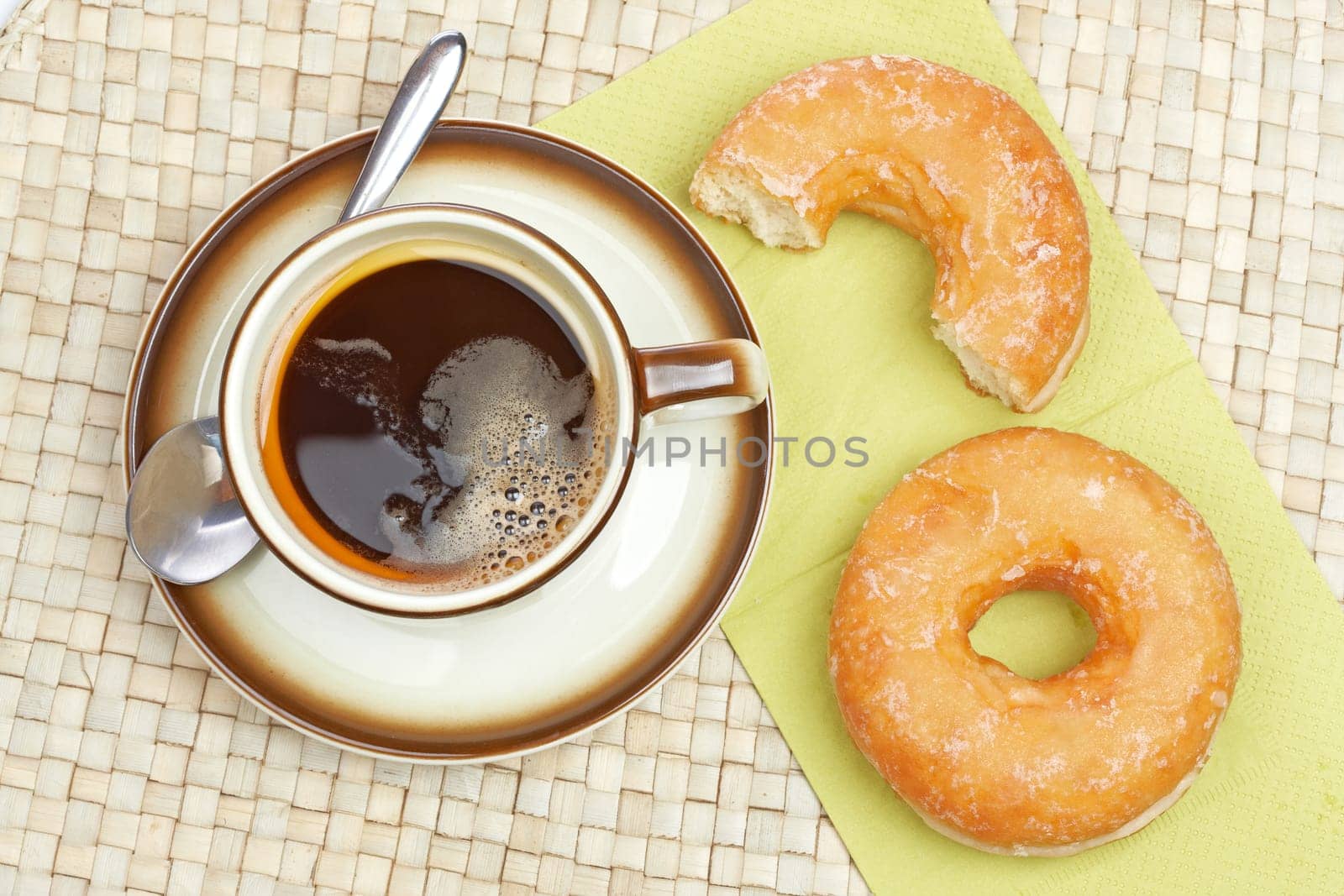 Delicious donuts with coffee