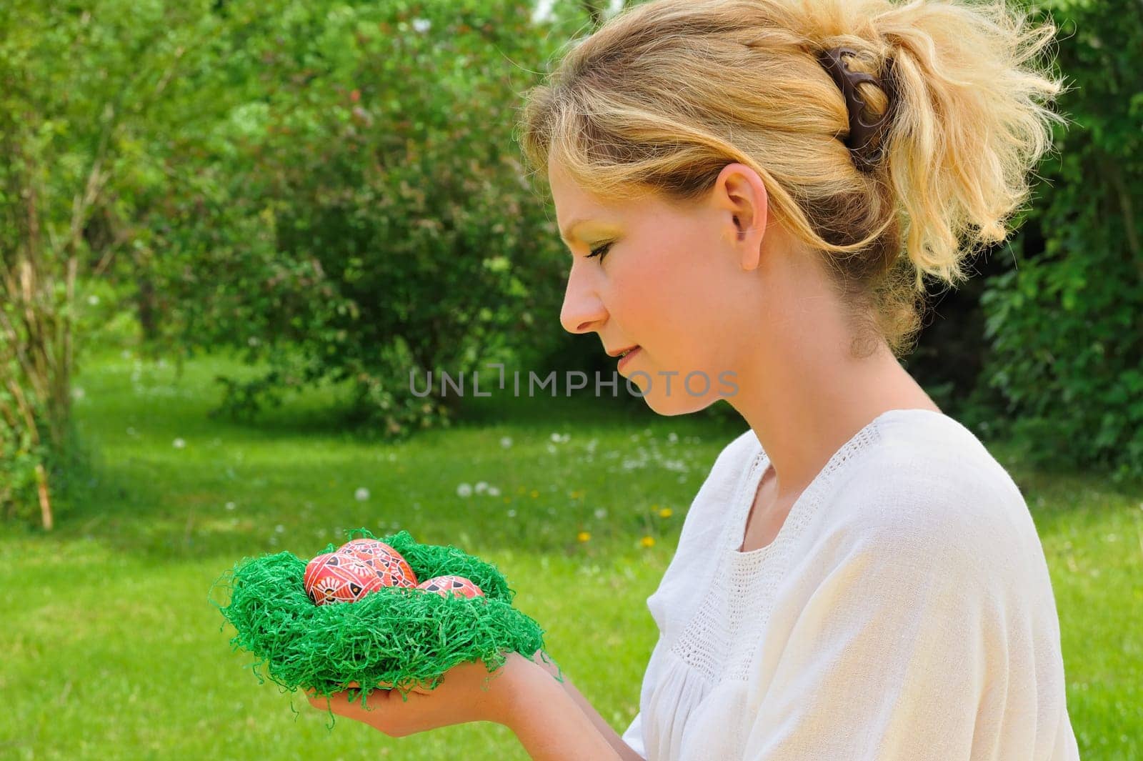 Young woman and easter eggs