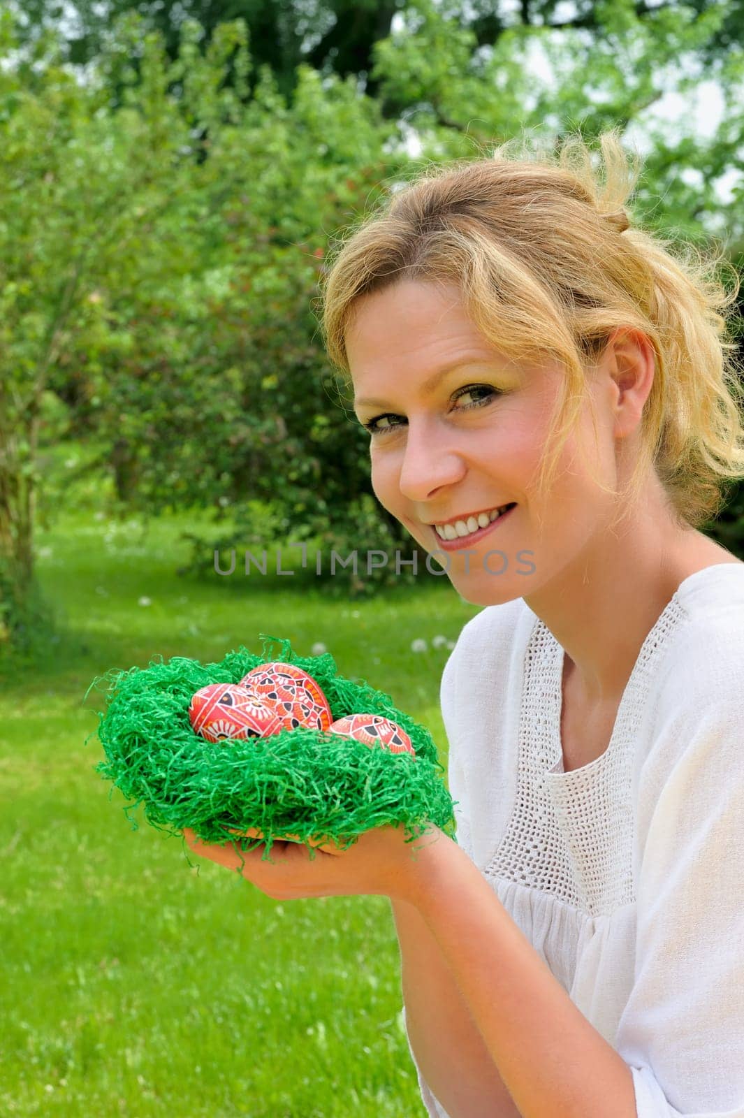 Young woman and easter eggs