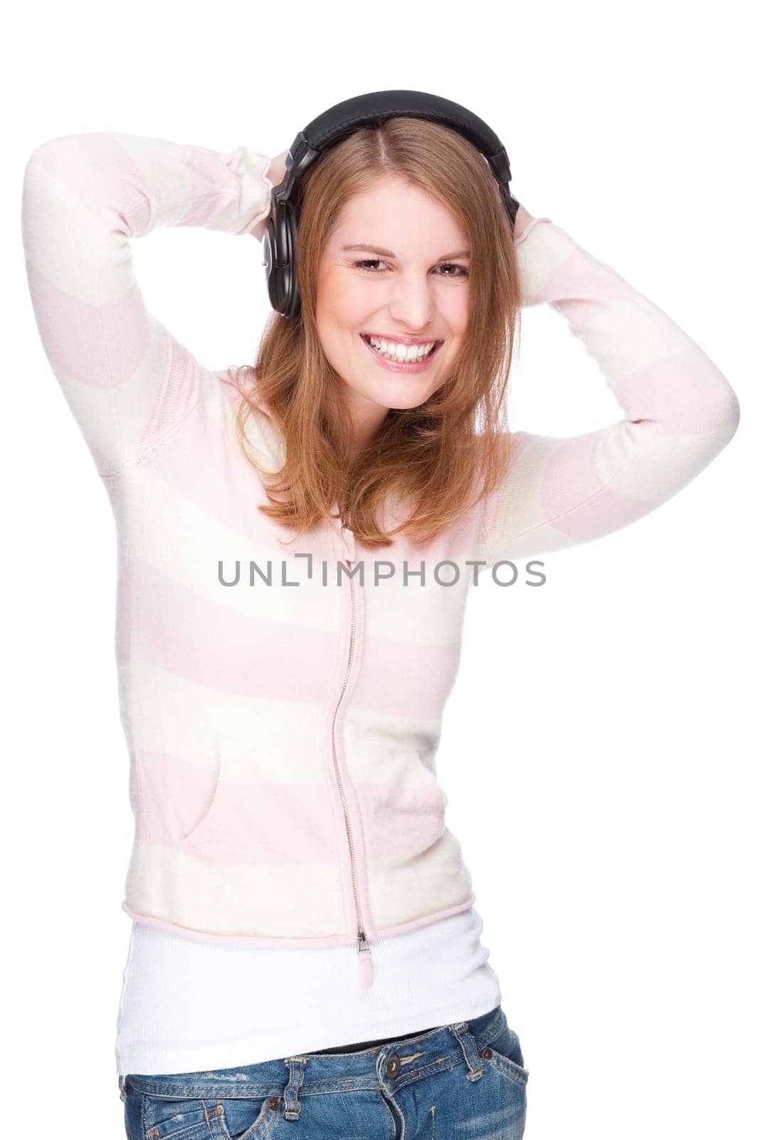 Young woman listens to music