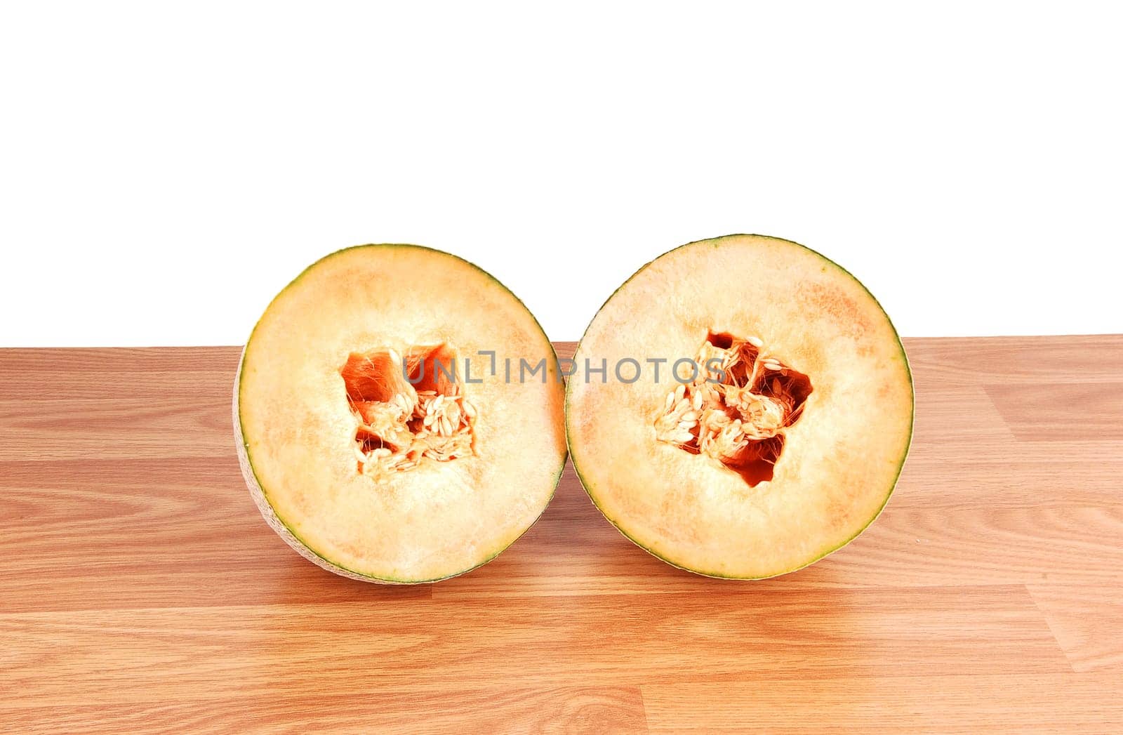 Two halve cantaloupes.