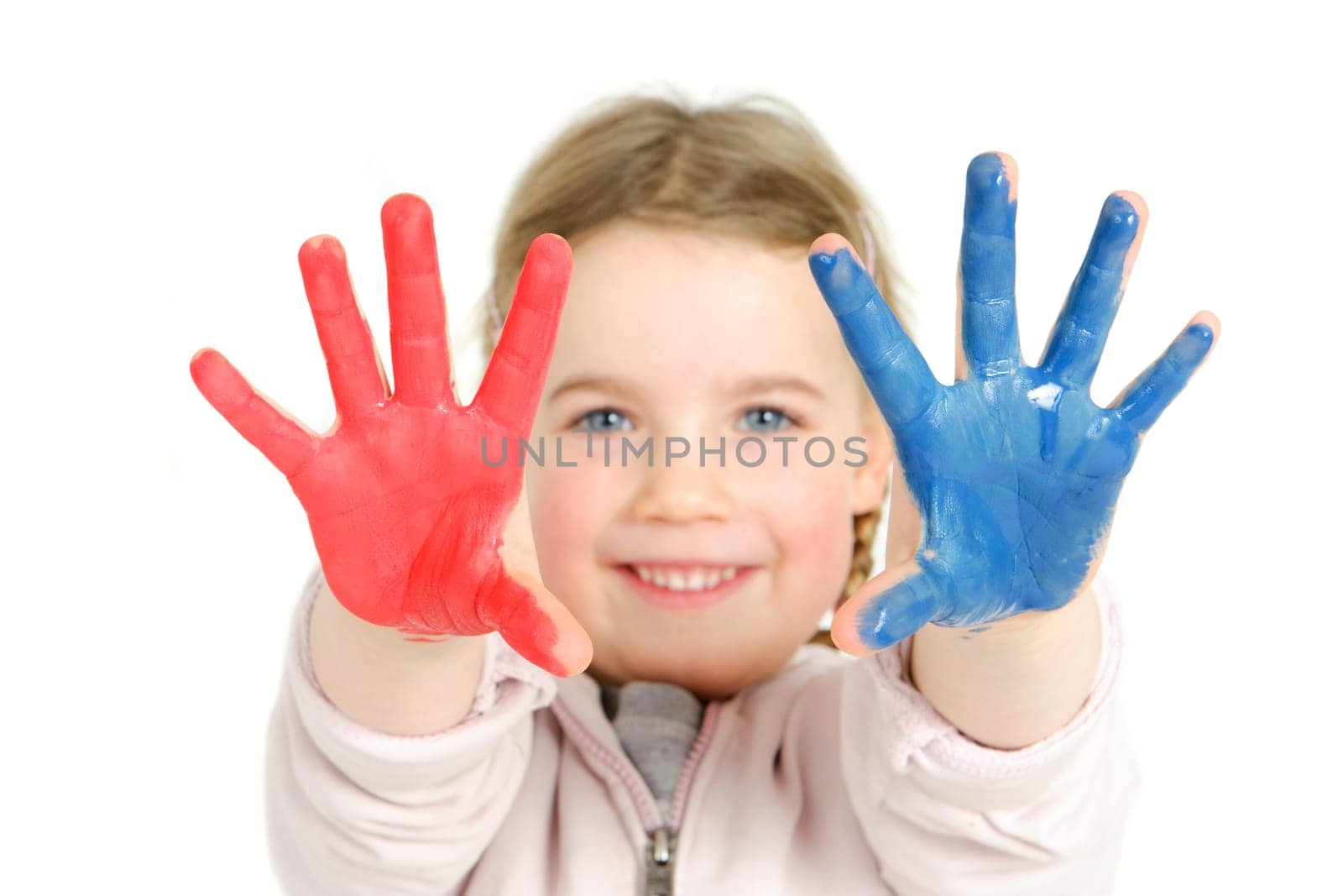 Toddler with finger paints