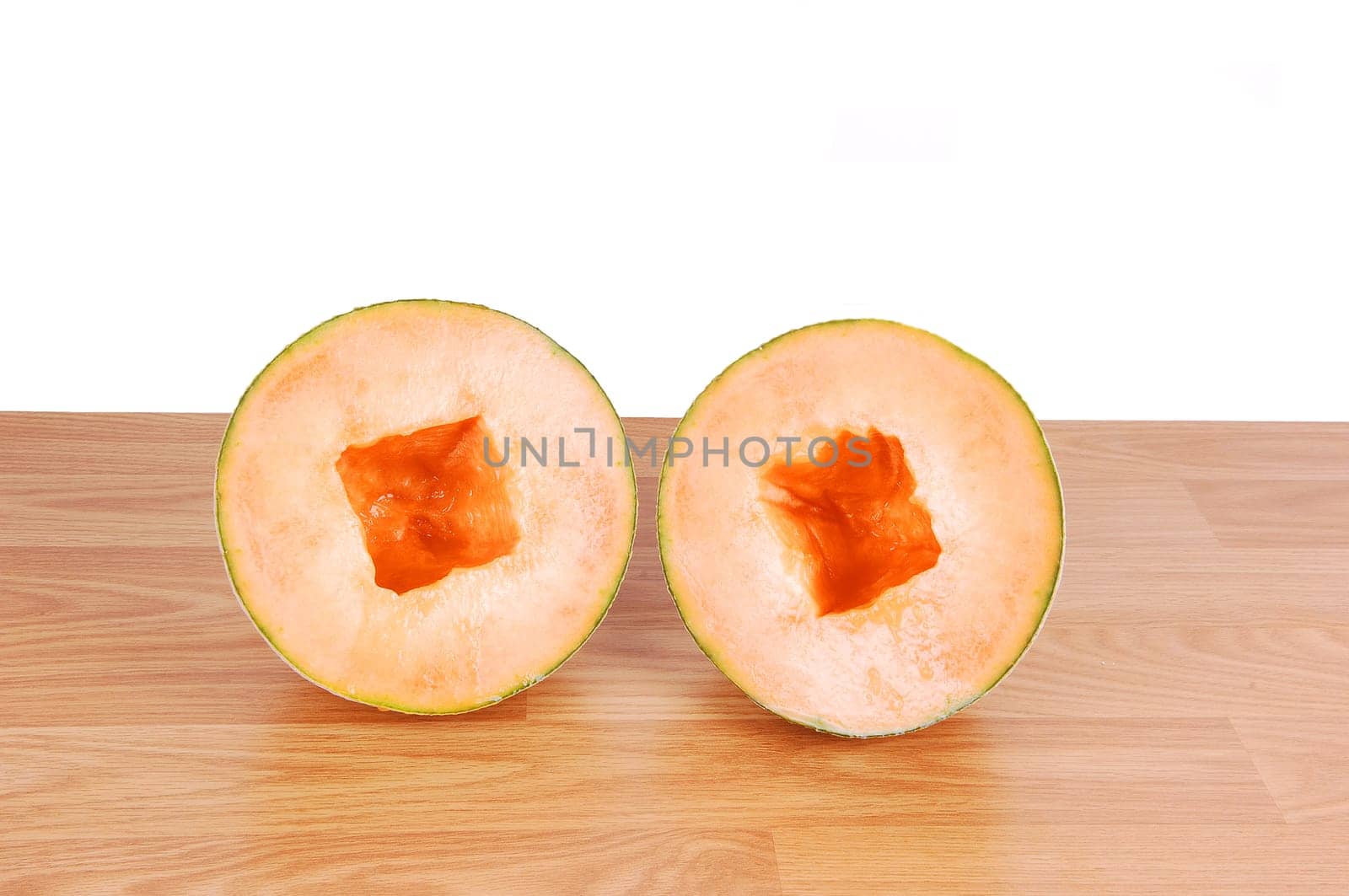 Two halve cantaloupes.