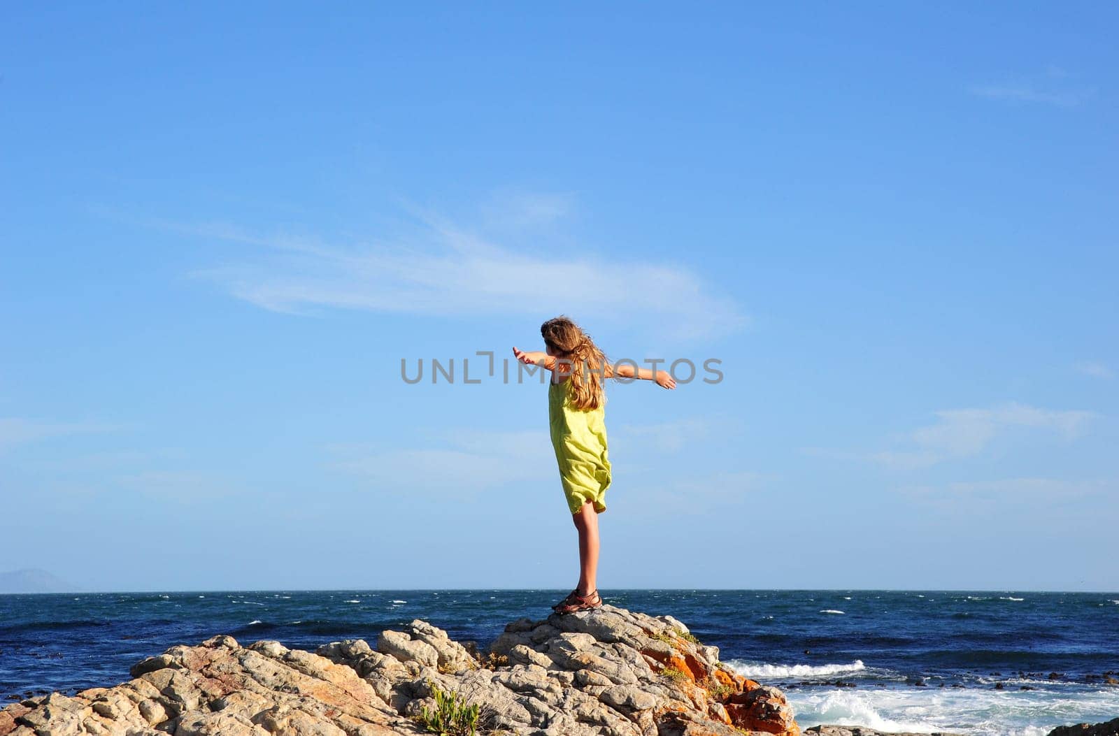 Pose by the sea