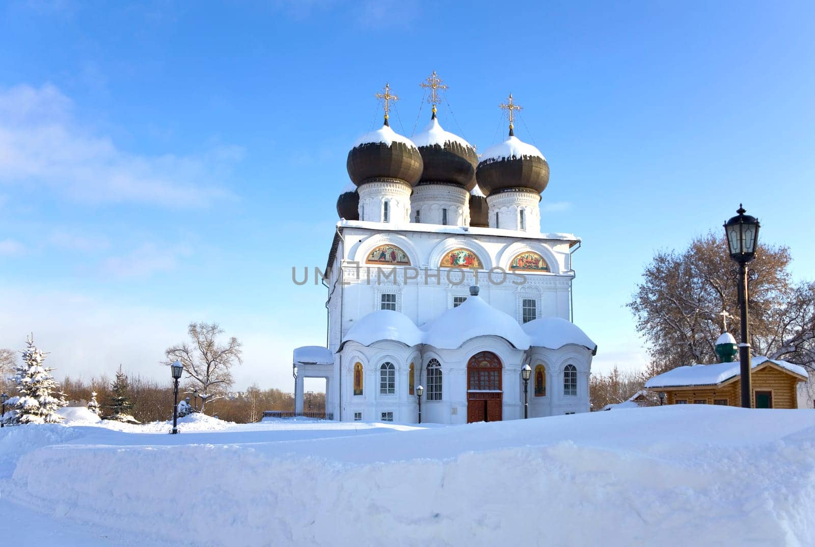 Christian monastery in winter sunny day