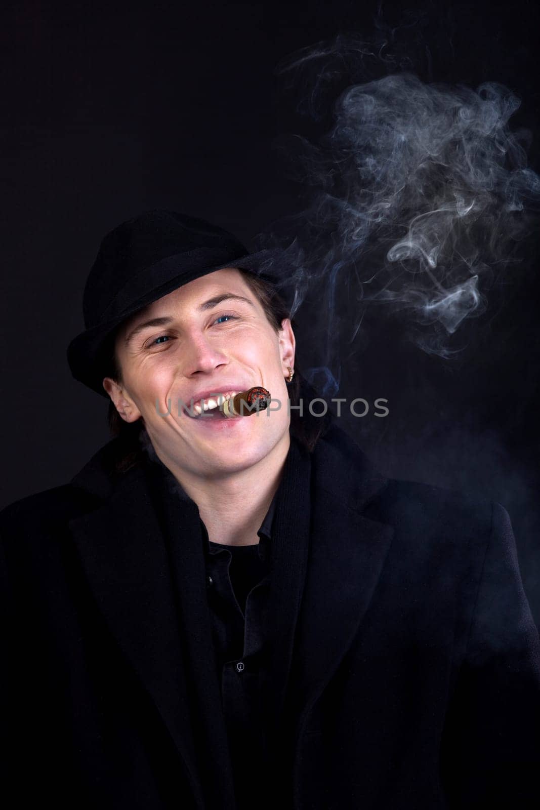 Man in black cloth think with serious look