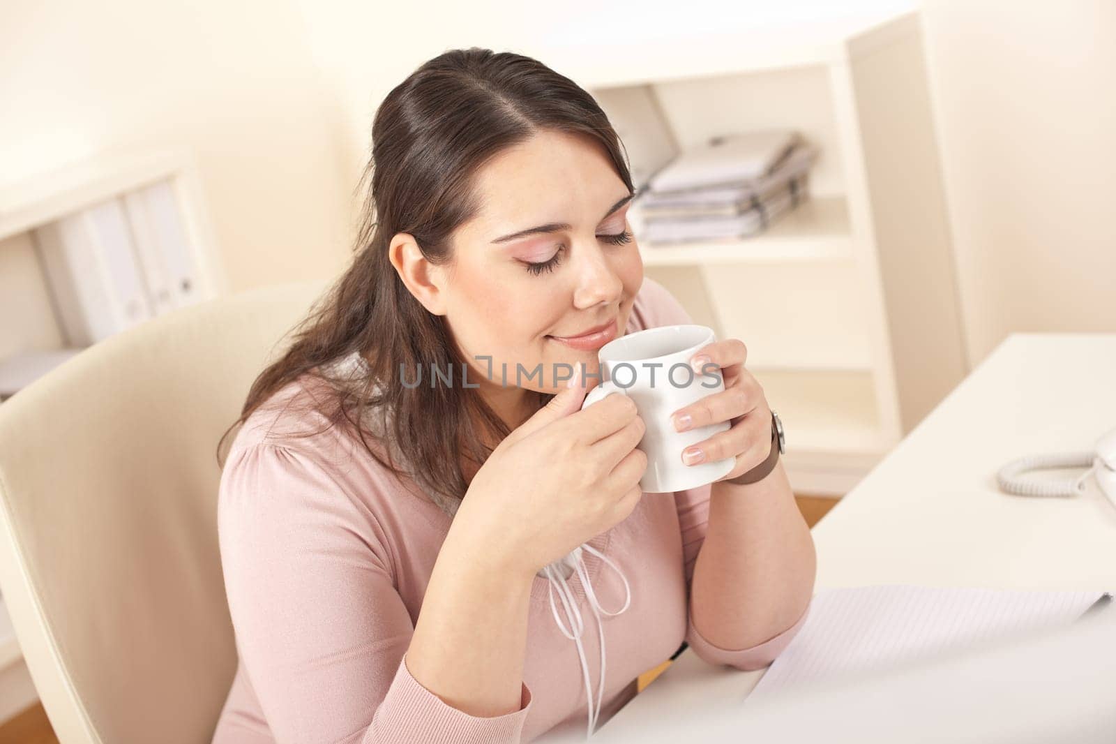 Young businesswoman at office
