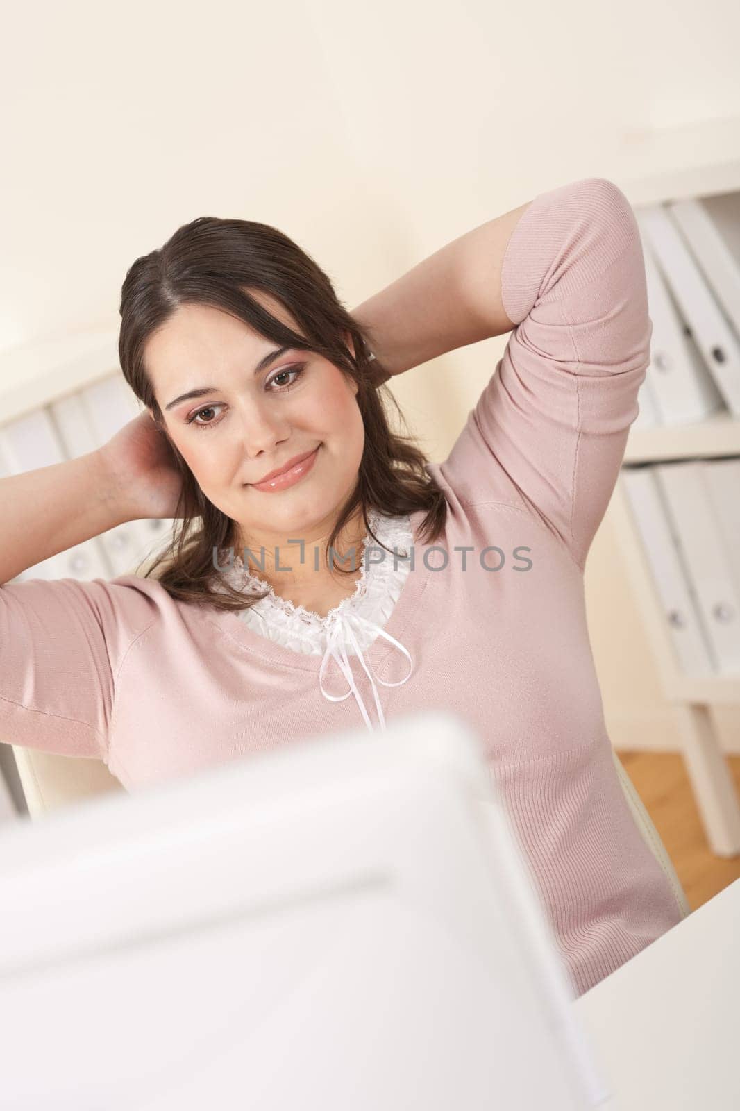Young businesswoman working at office