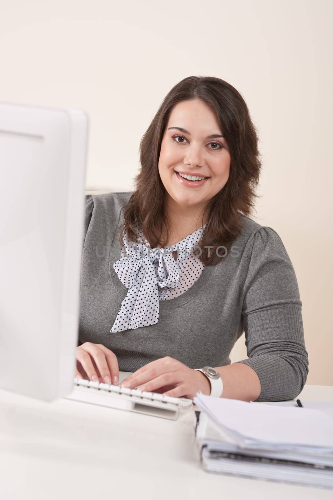 Young businesswoman working at office