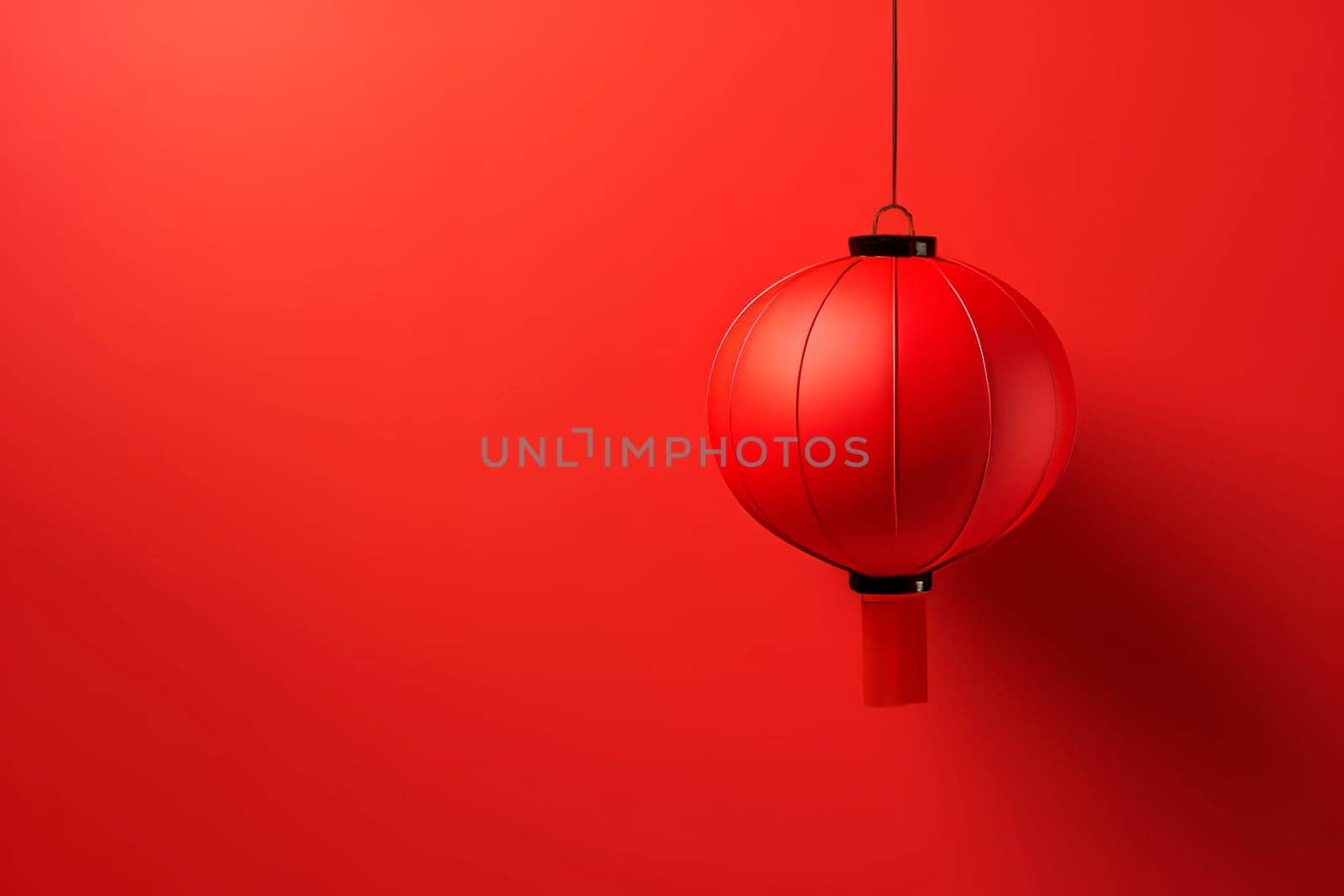 Red Chinese flashlight on a light background. Minimalism.
