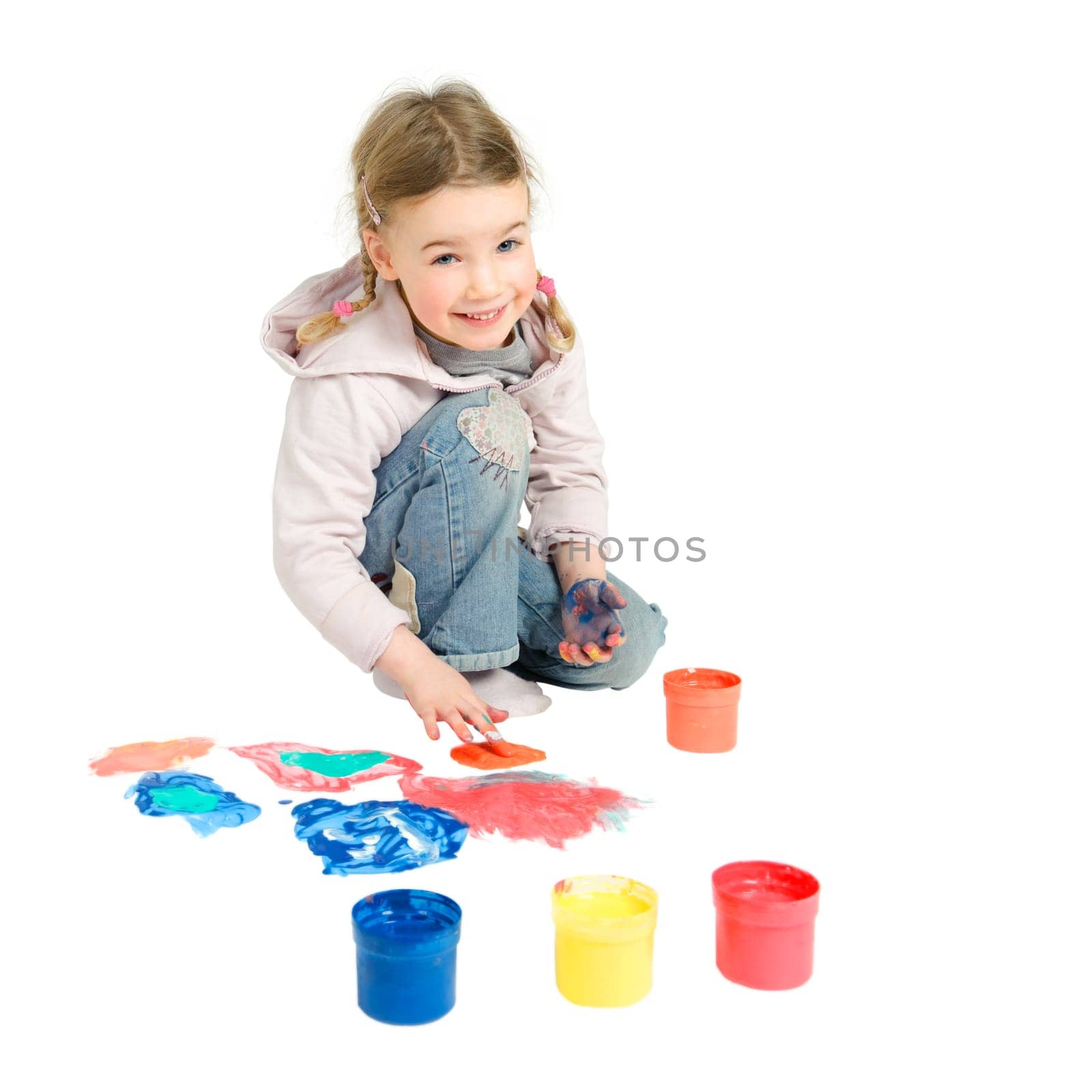 Toddler with finger paints