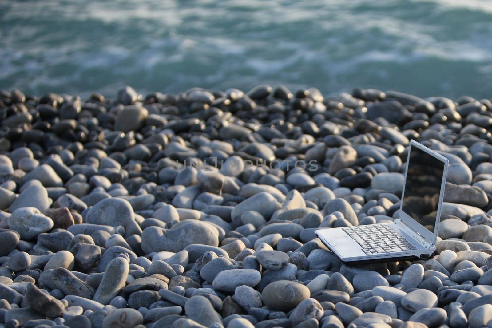 Laptop by the sea