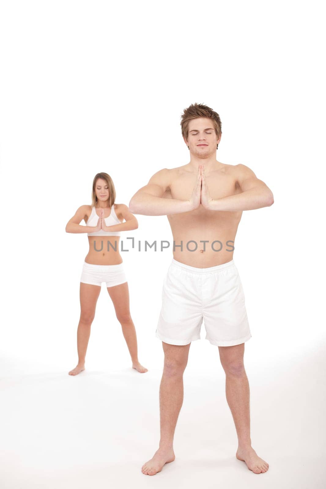 Fitness - Young healthy couple in yoga position
