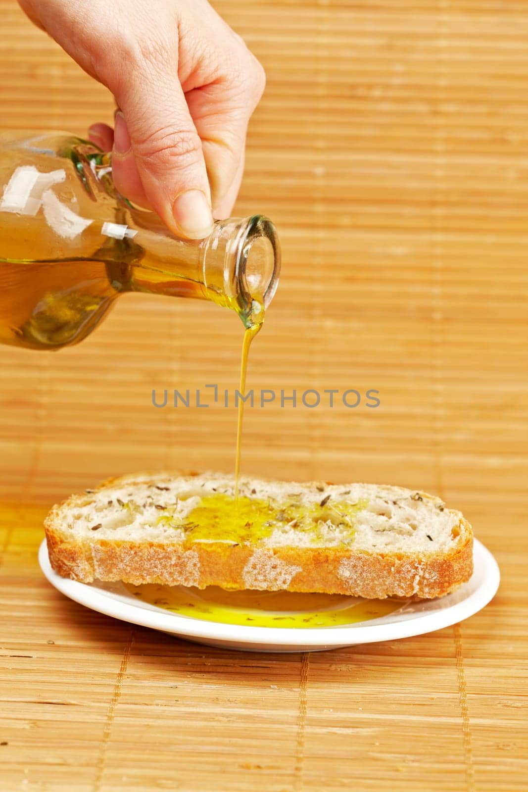 Pouring olive oil