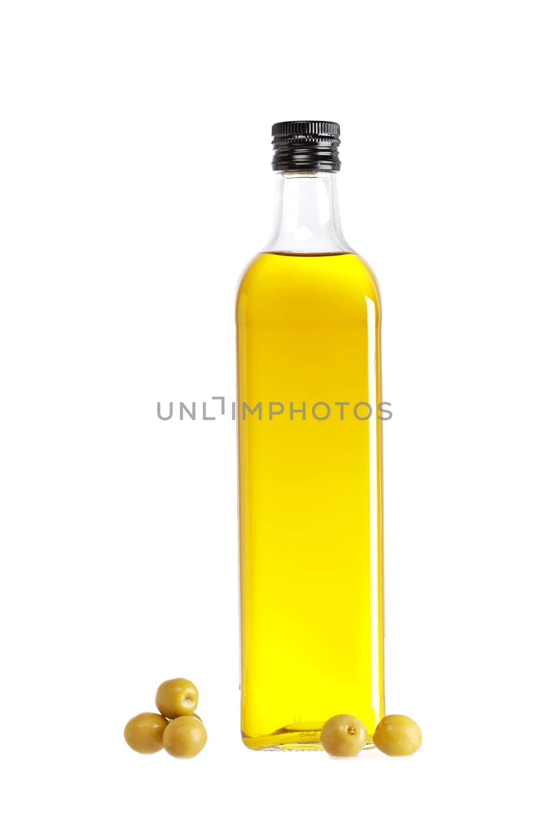 Olive oil bottle and some olives