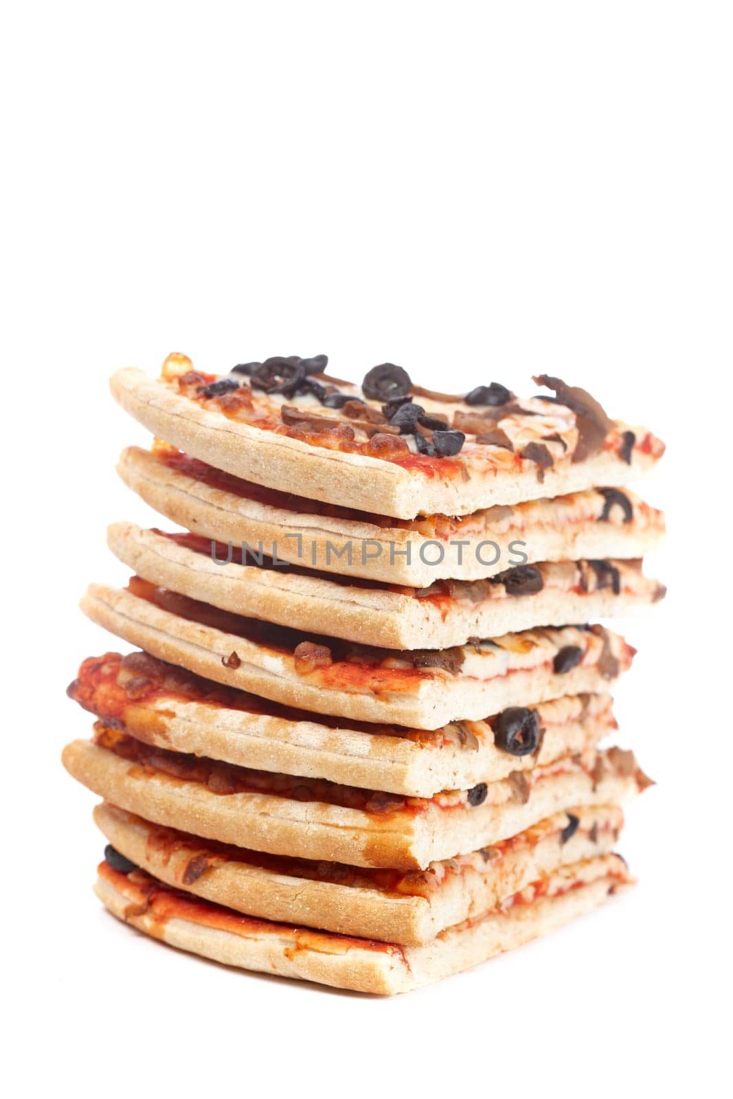 Slices of tasty Italian pizza stacked