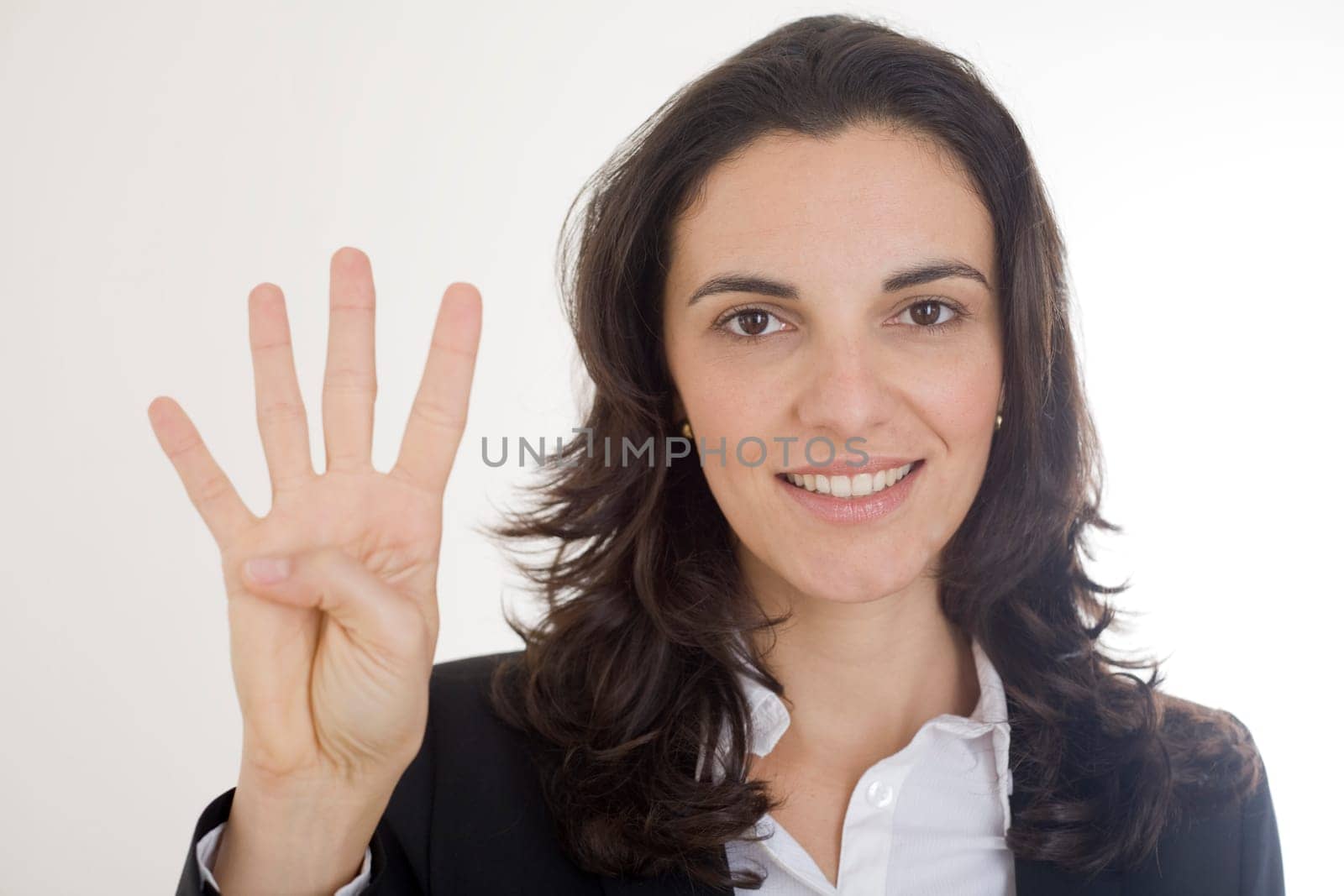 Woman showing the number 4 with four fingers