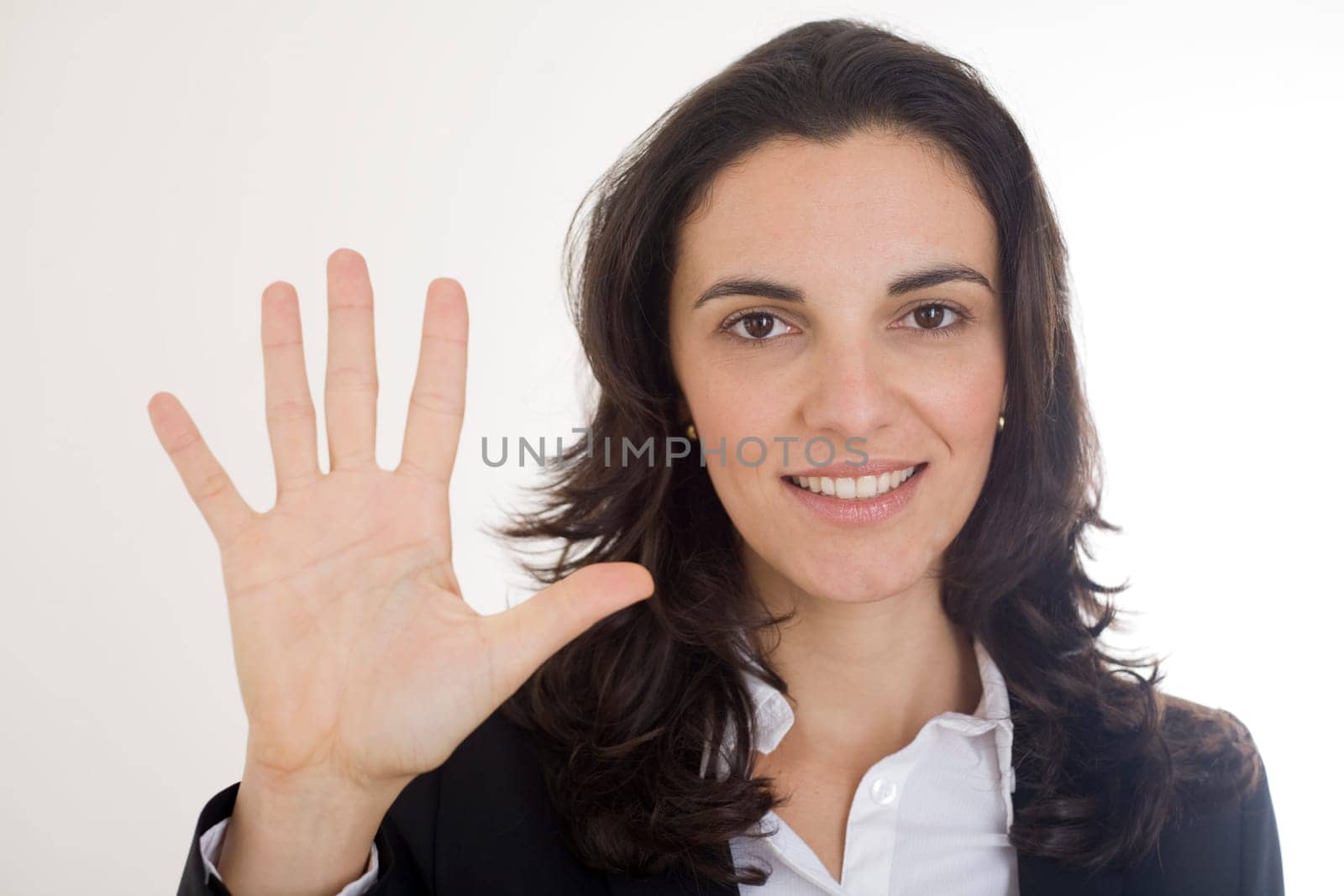 Woman showing the number 5 with five fingers
