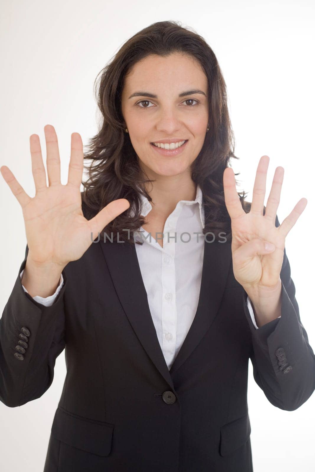 Woman showing the number 9 with nine fingers