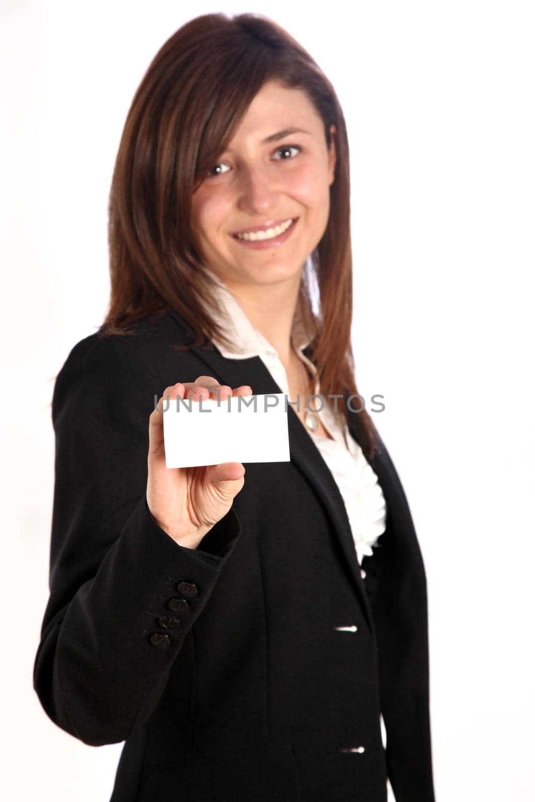Young woman smiling holding a blank business card