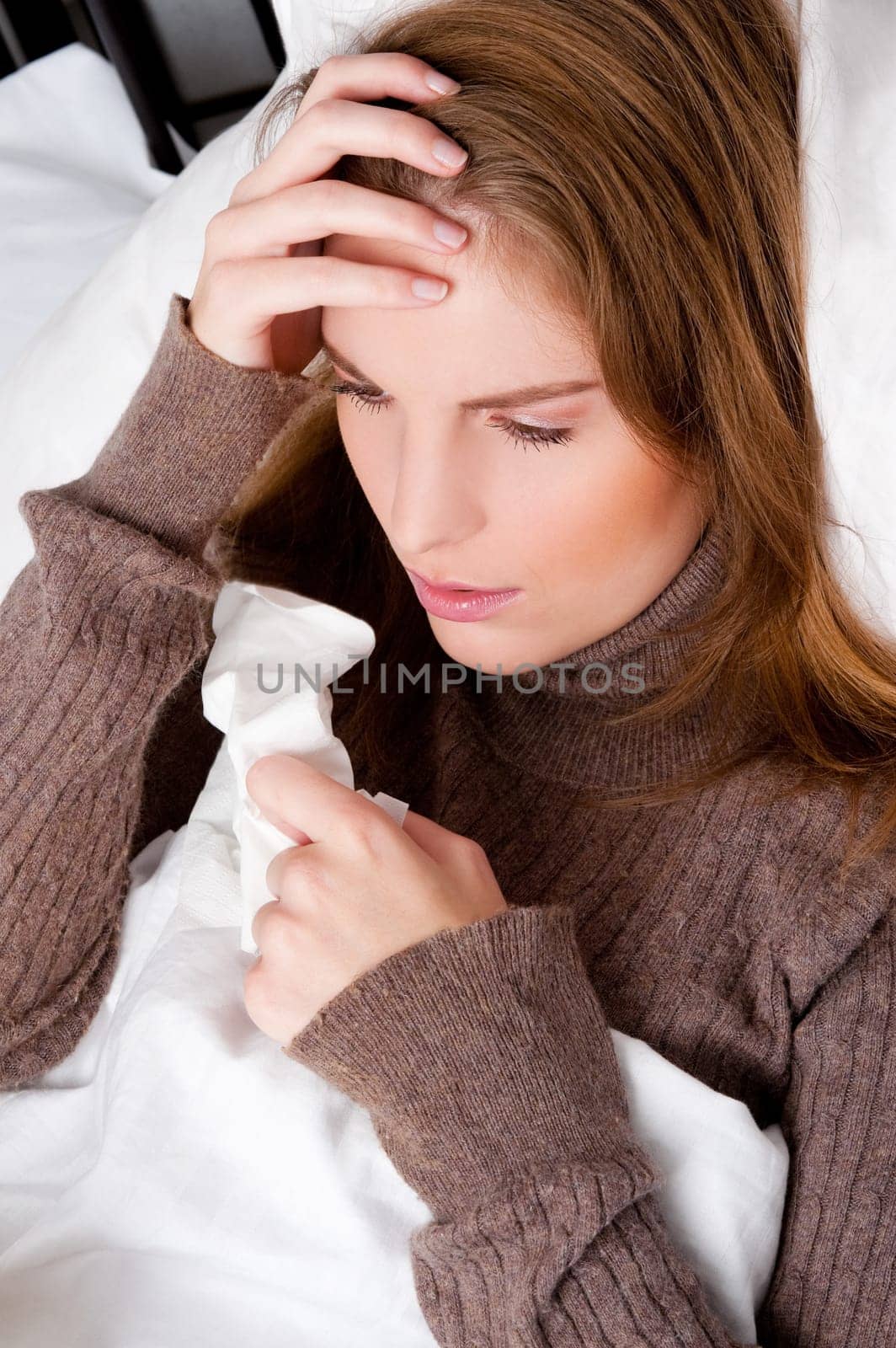 Young woman with runny nose