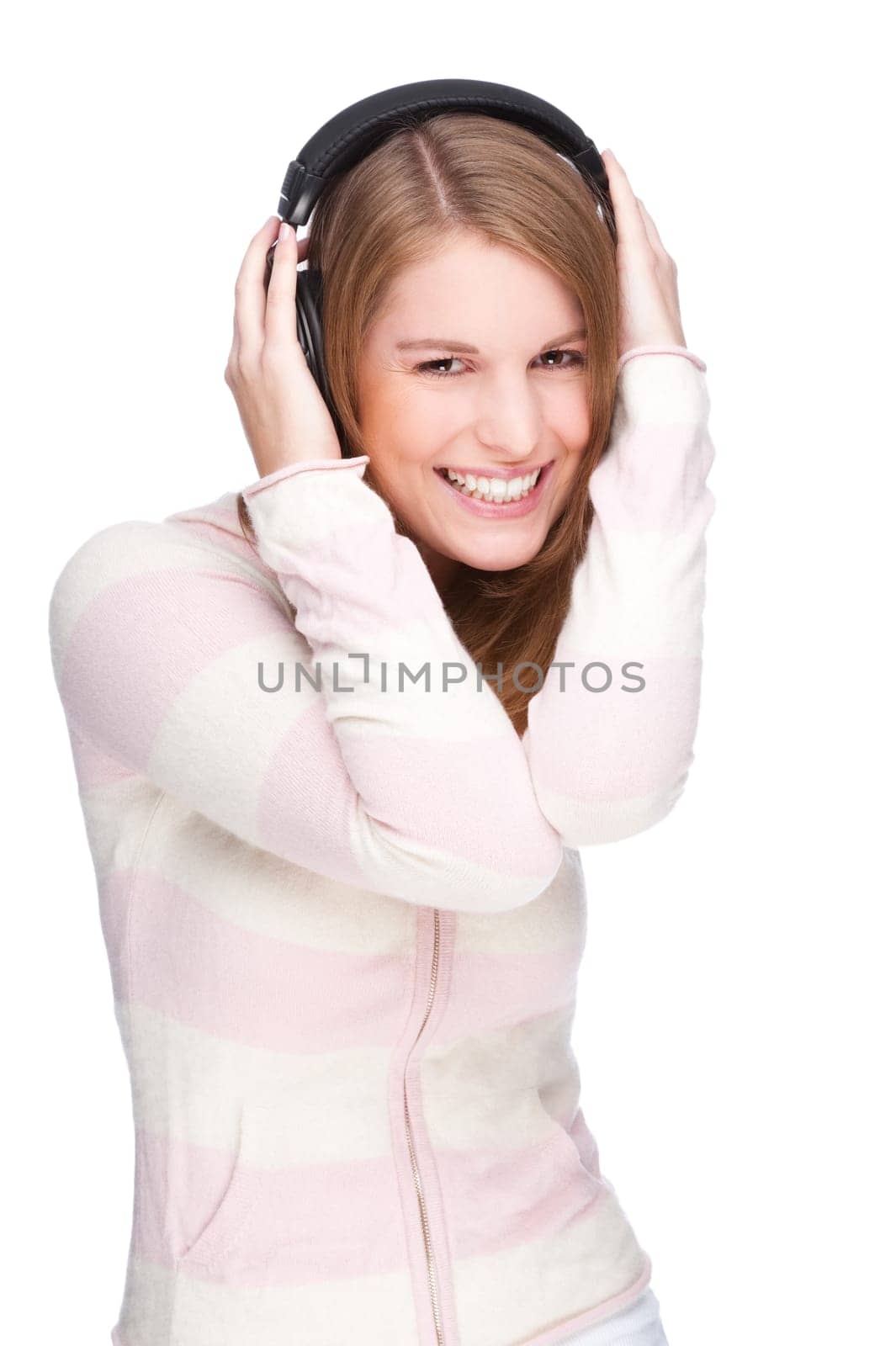 Young woman listens to music
