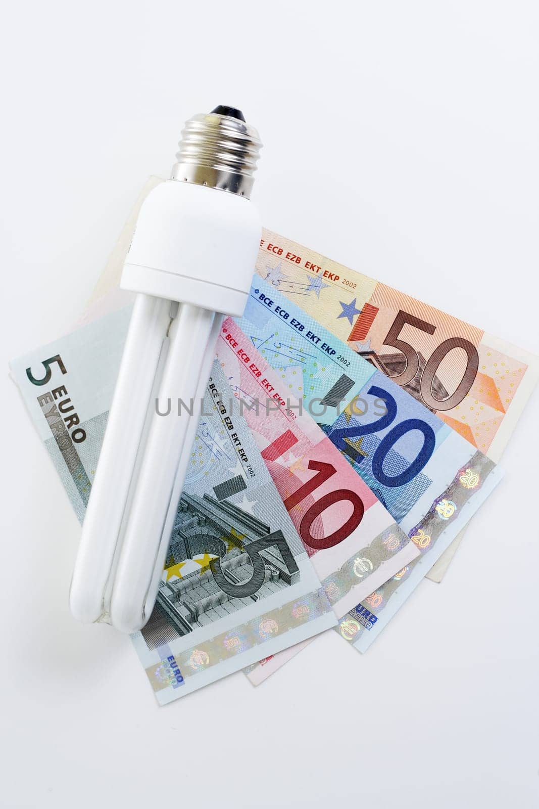Energy-saving lamp on euro banknotes
