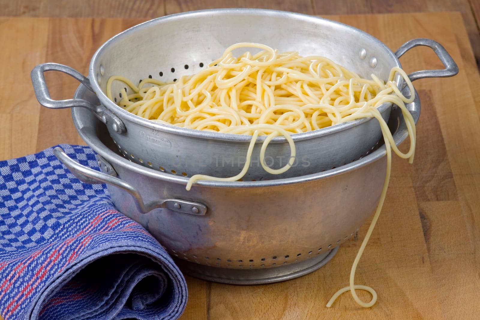Spaghetti in a colander
