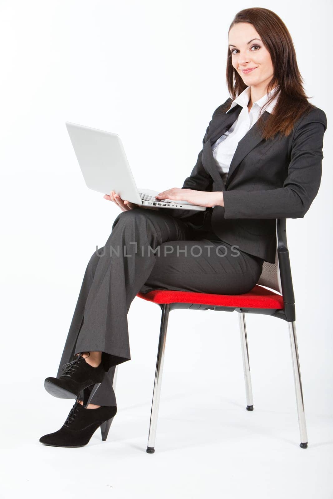 business woman walking with case