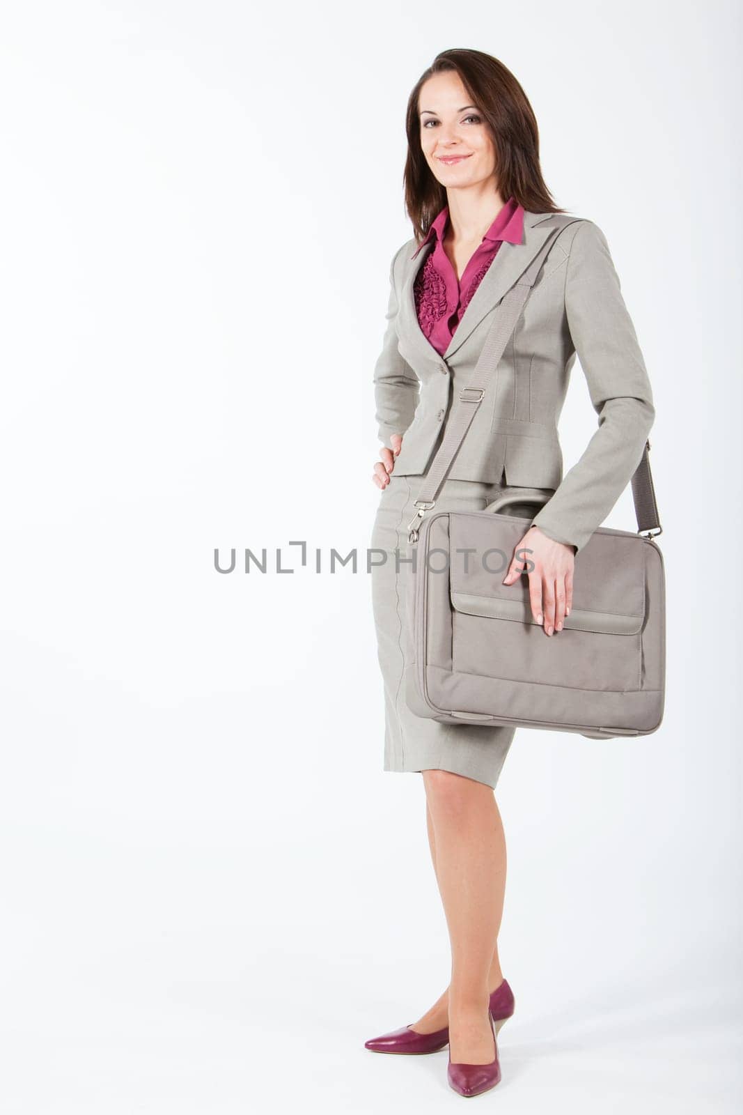 business woman walking with case