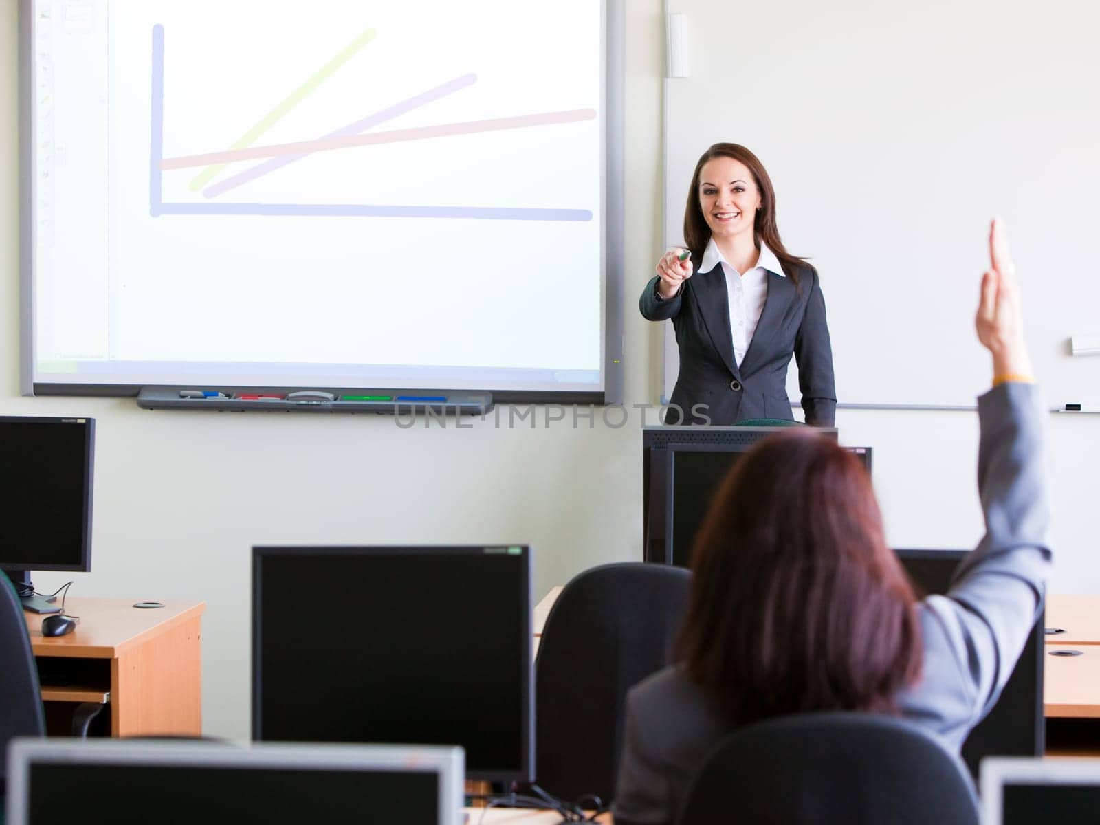 business woman walking with case