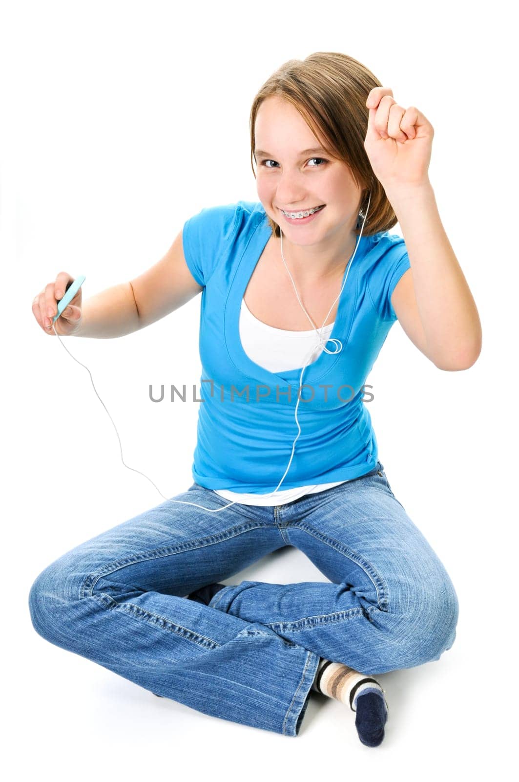 Teenage girl listening to music