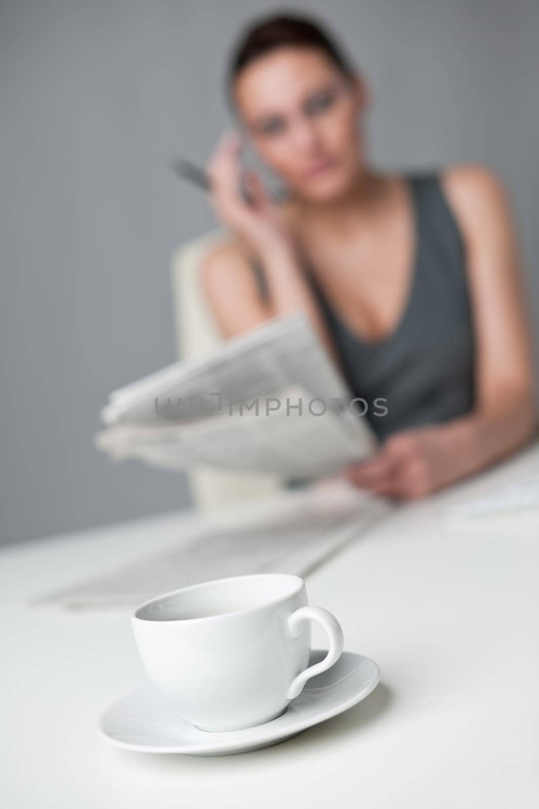 Successful businesswoman read newspaper at office