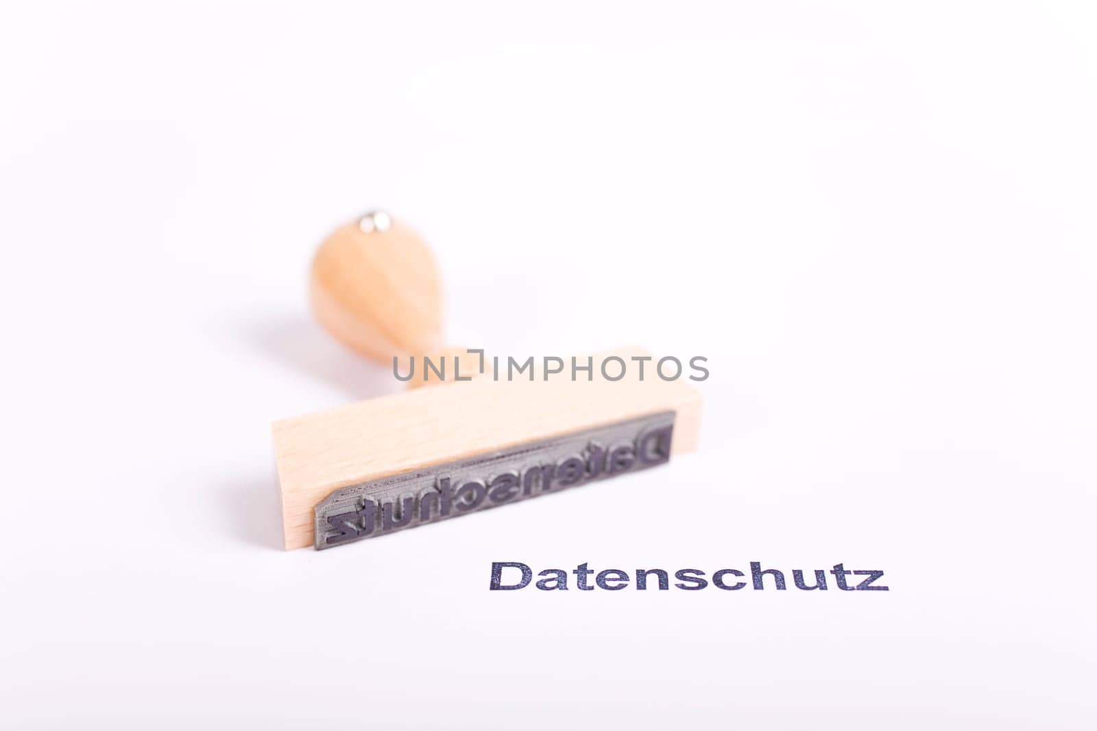Wooden stamp with the word Privacy Policy