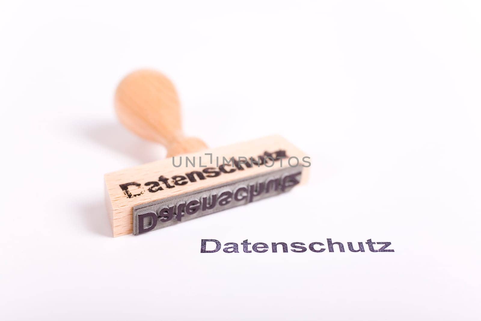 Wooden stamp with the word Privacy Policy